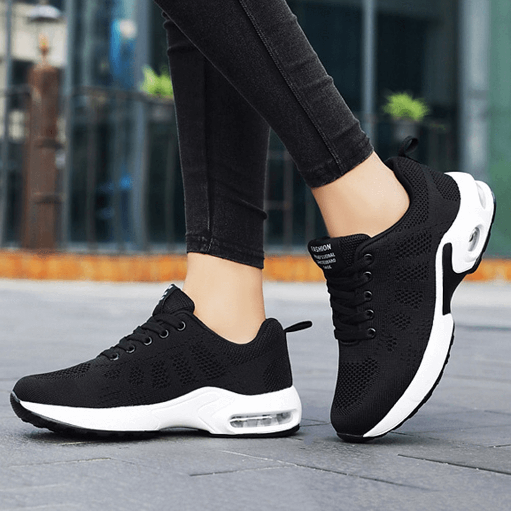Unisex breathable wear-resistant lace-up black running shoes with cushioned rubber outsole, perfect for stability and comfort.
